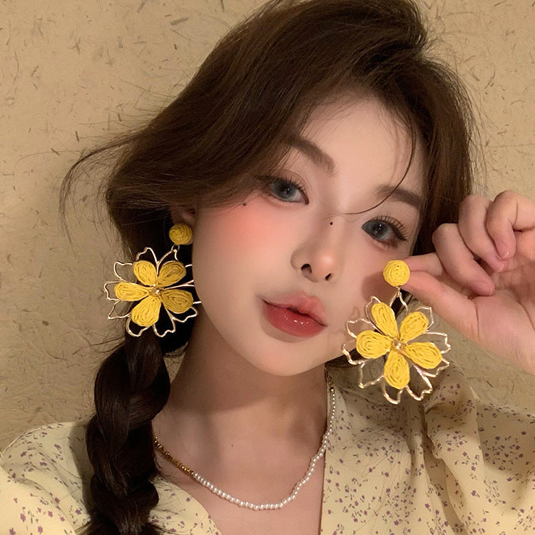 Vacation style woven sun flower earrings